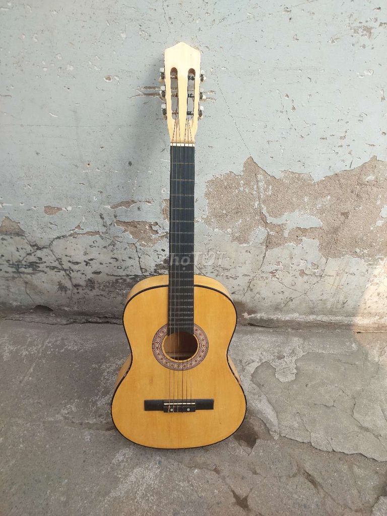 Mình thanh lý đàn Guitar Yamaha xài tốt bán