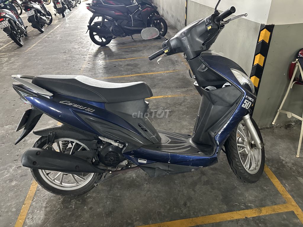 Синий скутер Kymco Candy Hi