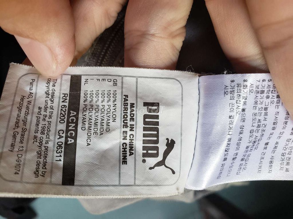 Cần bán túi đeo chéo puma