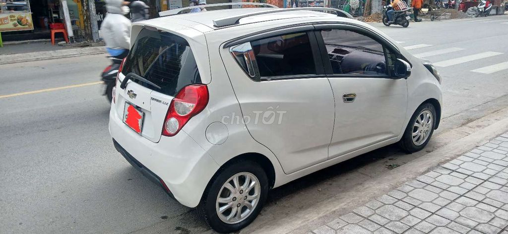Chevrolet Spark 2015 LTZ. Zest  Trắng số tự động. Mua bán Ô tô tại Quận 12 Tp Hồ Chí Minh được đăng bởi Gia Han  hình 3