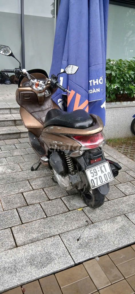 Honda PCX 125cc 2011 màu vàng kim. Mua bán Xe máy tại Quận 7 Tp Hồ Chí Minh được đăng bởi Quí Dương Hùng hình 3