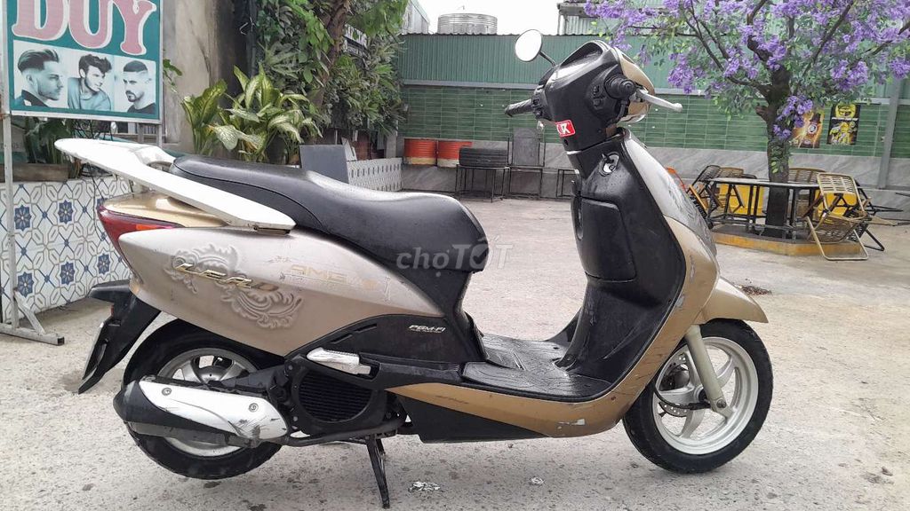 Honda Lead 110/2010 из бронзового золота