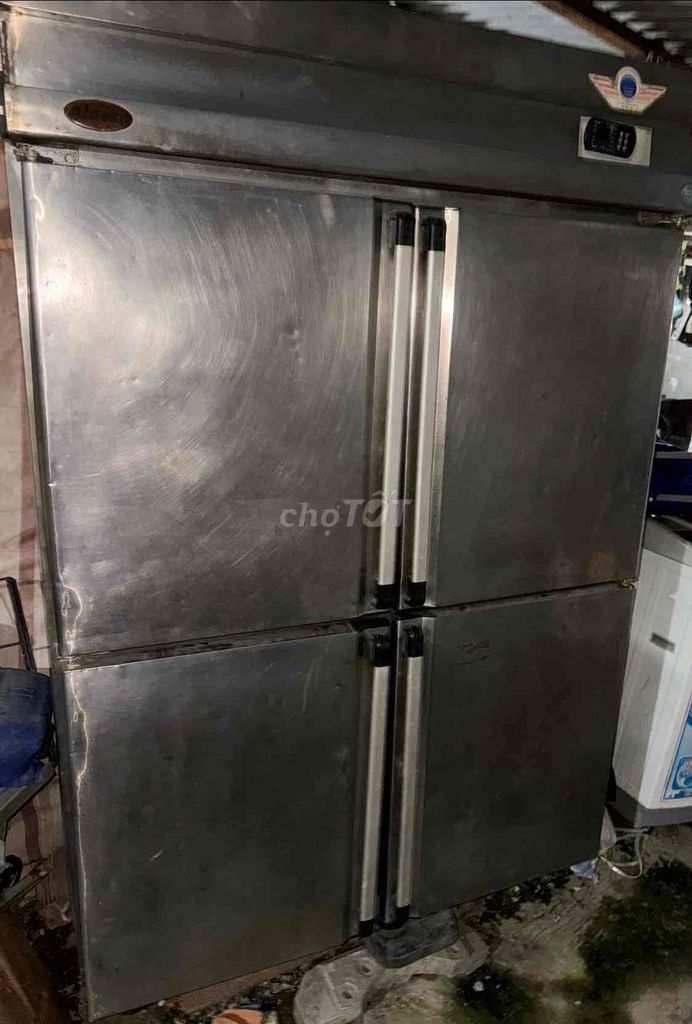 ra nhanh em tủ inox 4 cánh