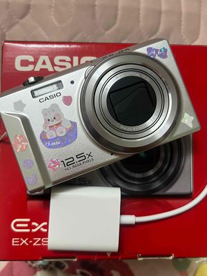 MÁY ẢNH CASIO EXILIM EX-ZS100 màu bạc + full box