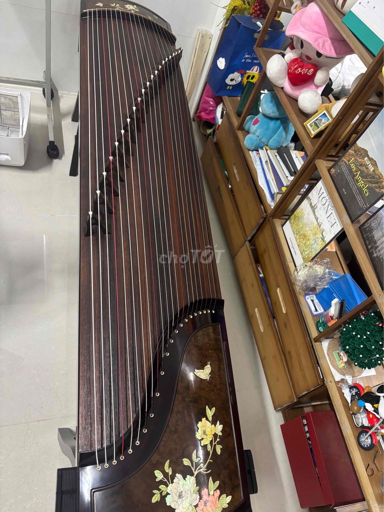 Đàn tranh gỗ chạm khắc hoa. Mua bán Nhạc cụ tại Huyện Long Thành Đồng Nai được đăng bởi Truc Vo hình 1
