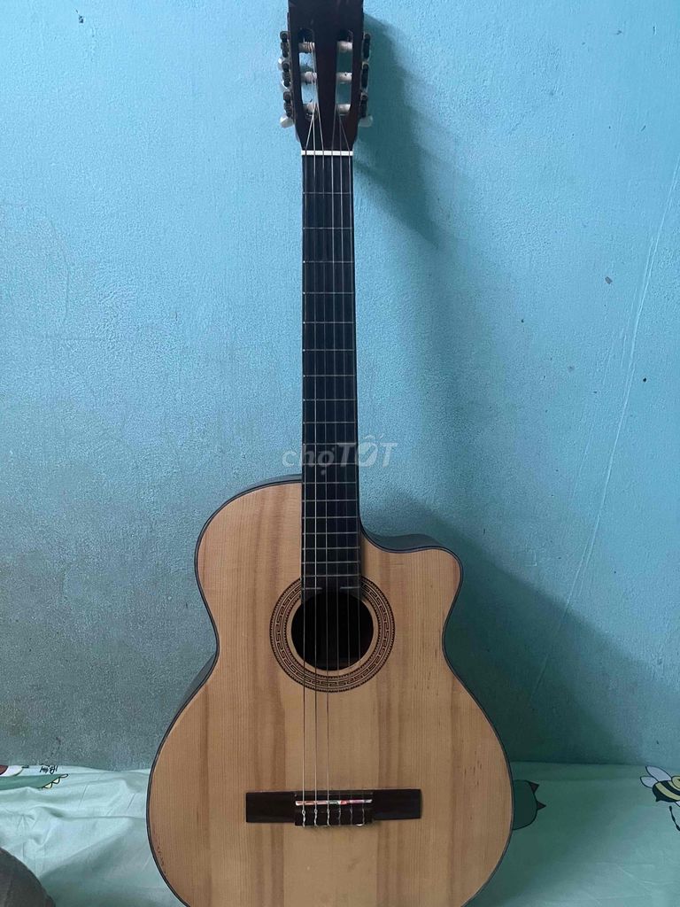 Đàn guitar gỗ màu gỗ đã dùng. Mua bán Nhạc cụ tại Thành phố Cao Lãnh Đồng Tháp được đăng bởi Minh Nhựt hình 1