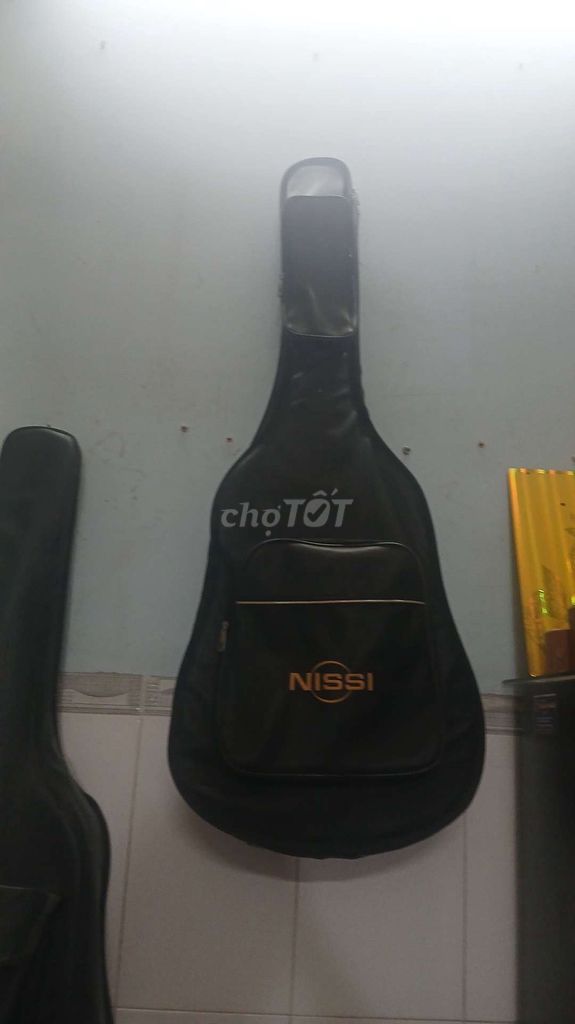Đàn guitar acoustic Nissi 6 dây Nâu lớn. Mua bán Nhạc cụ tại Thành phố Qui Nhơn Bình Định được đăng bởi Trần Bảo Trâm hình 1