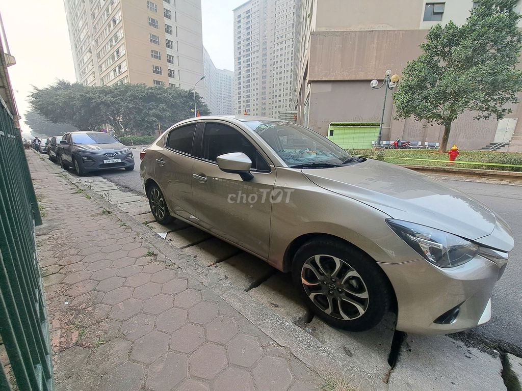 Mazda 2 Vàng cát. Mua bán Ô tô tại Quận Hà Đông Hà Nội được đăng bởi Lê Thanh Tài hình 5