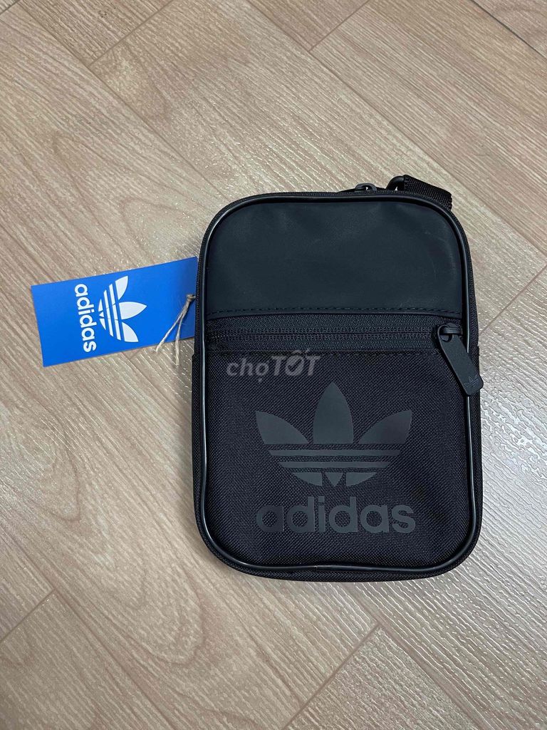 Túi đeo chéo Adidas Unisex Vải Đen. Mua bán Túi xách tại Thành phố Thuận An Bình Dương được đăng bởi Phi Hoang hình 1