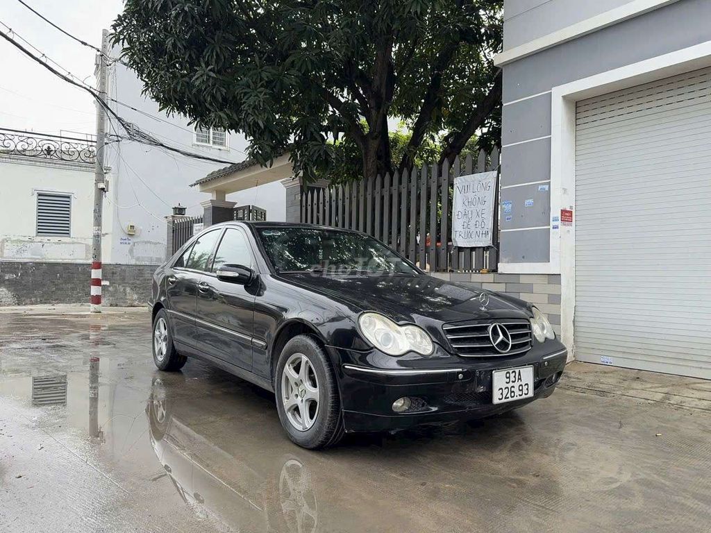 Mercedes 2001 stđ 456789km màu đen chính chủ ký..