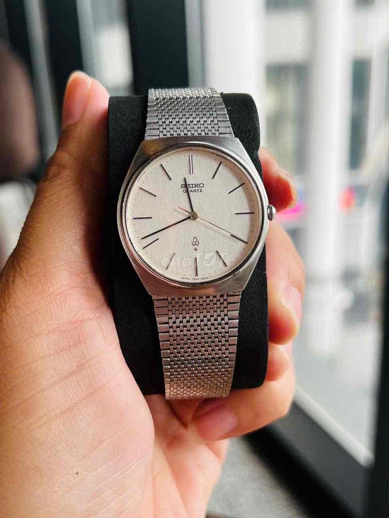 Seiko quartz 7830 mặt trắng vân tổ ong, dây lụa