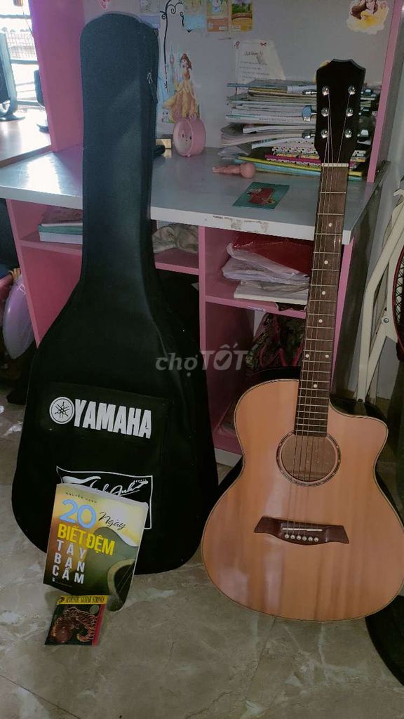 Đàn guitar acoustic mới