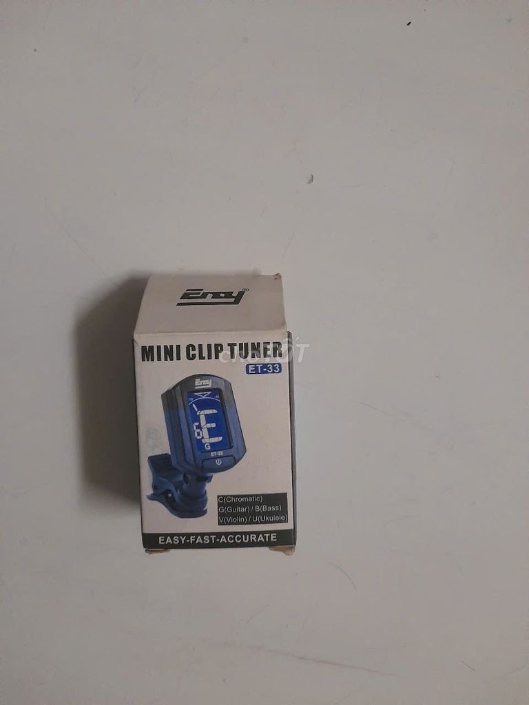 Dụng cụ chỉnh dây đàn ghi ta. Chạy bằng pin,
