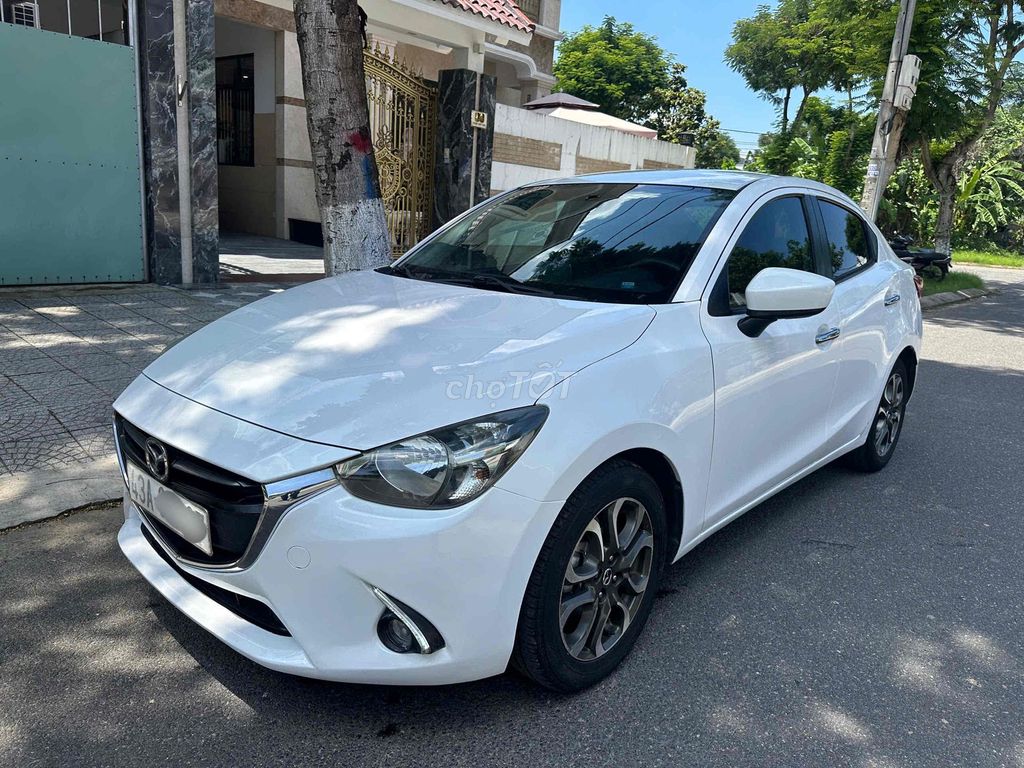 Mazda Mazda 2 2016 Белый 110 тыс. км