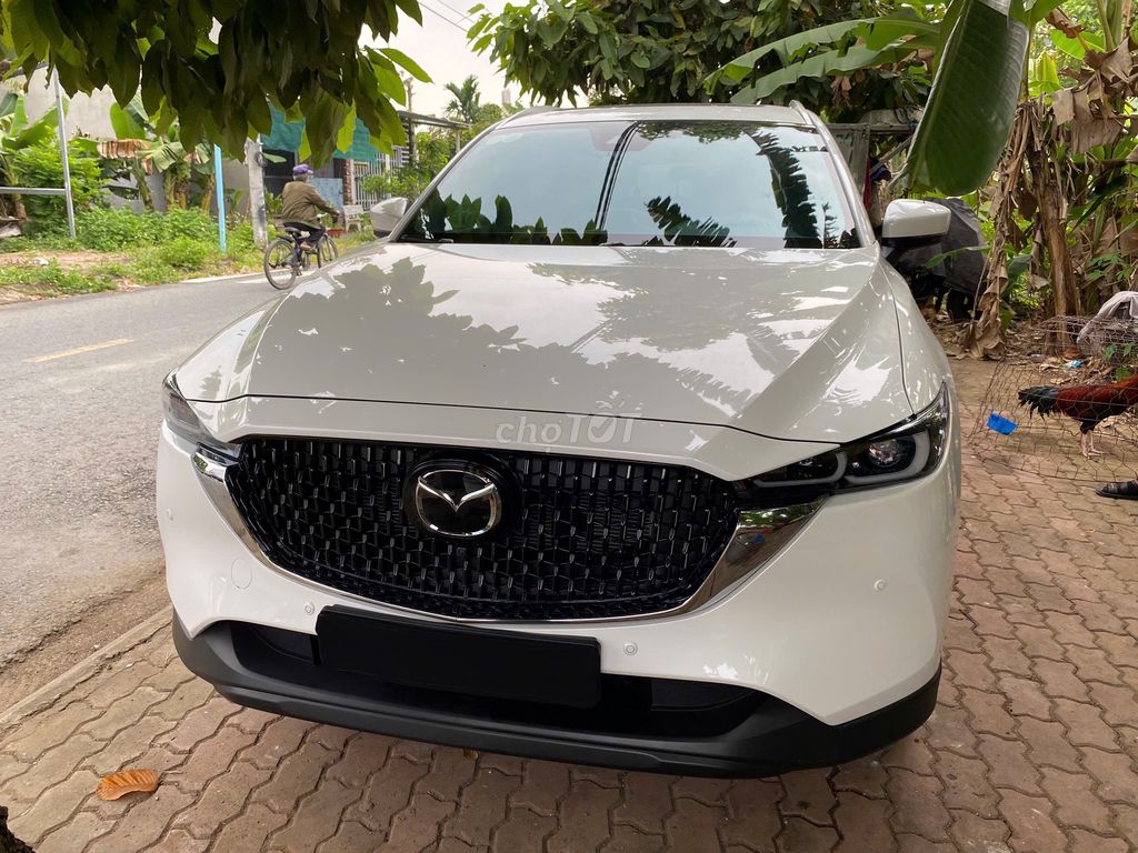 CX8 2025 Premium Trắng 3.000 km. Mua bán Ô tô tại Quận 12 Tp Hồ Chí Minh được đăng bởi Song Hành hình 1