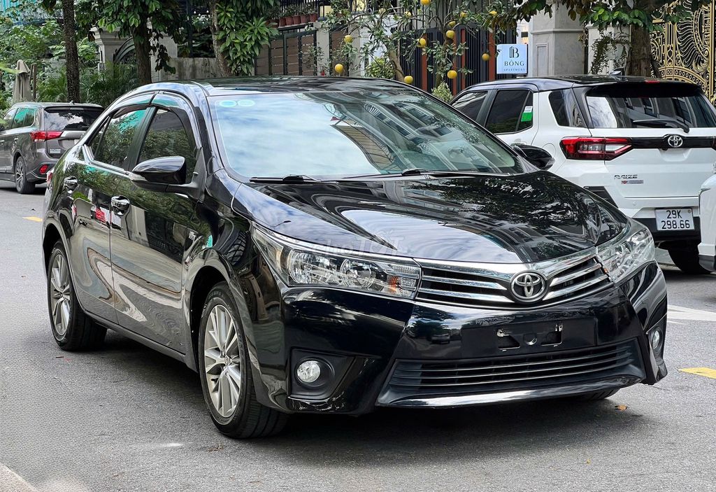 Toyota Corolla Altis 1.8G 2015 màu đen. Mua bán Ô tô tại Quận Long Biên Hà Nội được đăng bởi PHÚC LÂM  AUTO hình 2