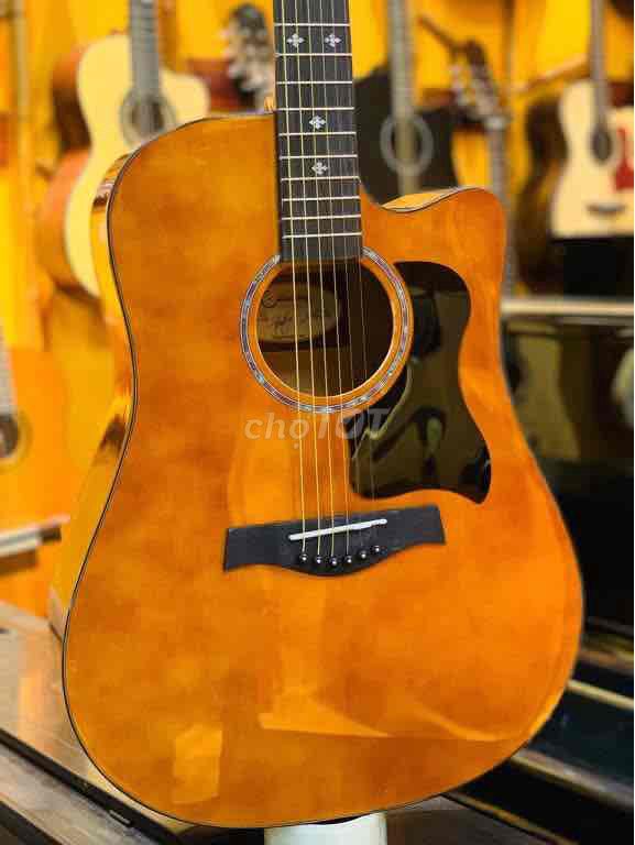 Đàn guitar gỗ thịt Nâu cam. Mua bán Nhạc cụ tại Quận Bắc Từ Liêm Hà Nội được đăng bởi Lê Thành Long hình 1