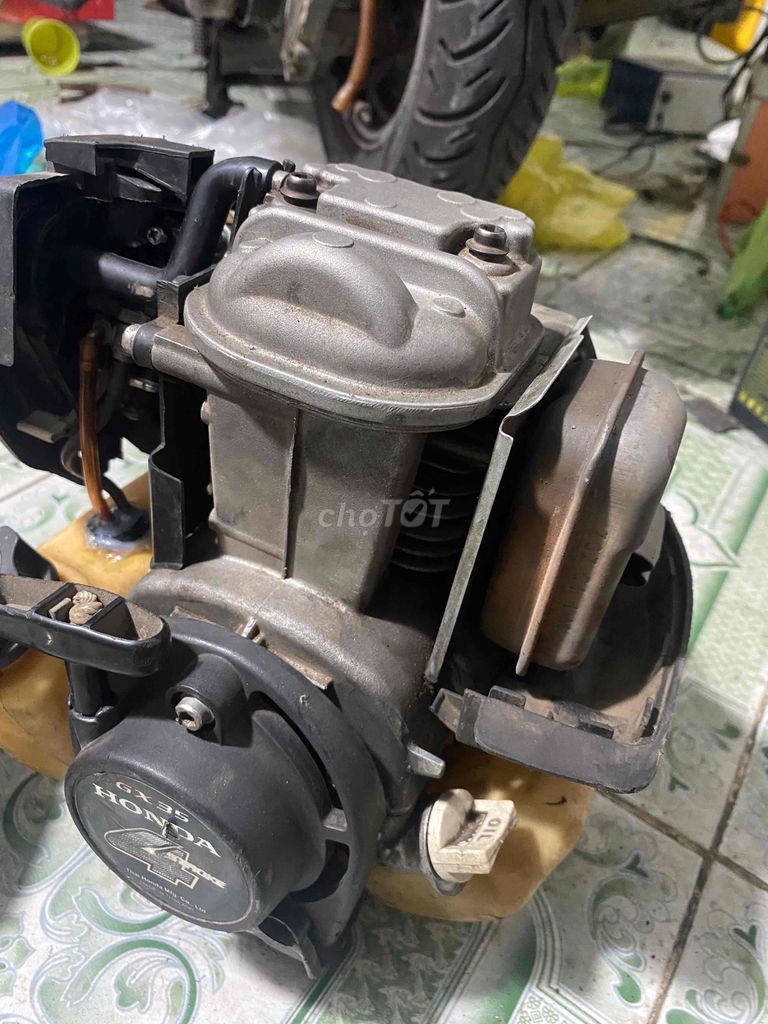 đầu máy cắt cỏ