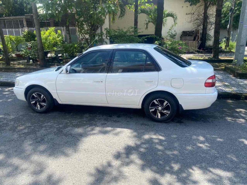 Toyota Corolla 1.6 Trắng 5 chỗ. Mua bán Ô tô tại Thành phố Bến Tre Bến Tre được đăng bởi Phương Bến Tre hình 15