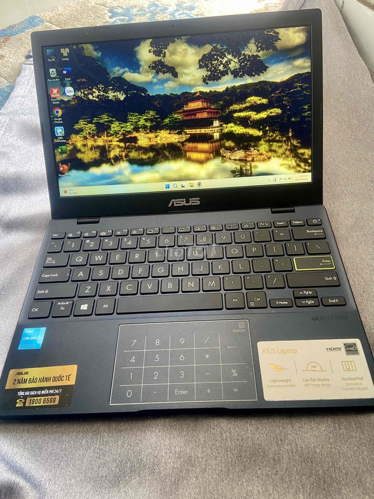 Laptop ASUS VIVOBOOK E210 Intel Celeron Đen. Mua bán Laptop tại Quận Tân Phú Tp Hồ Chí Minh được đăng bởi Việt Lê hình 1