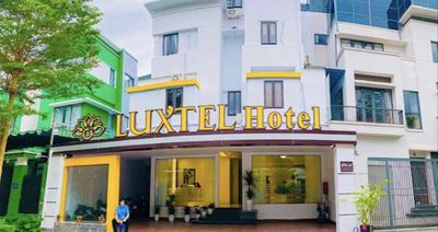 LUXTEL HOTEL logo