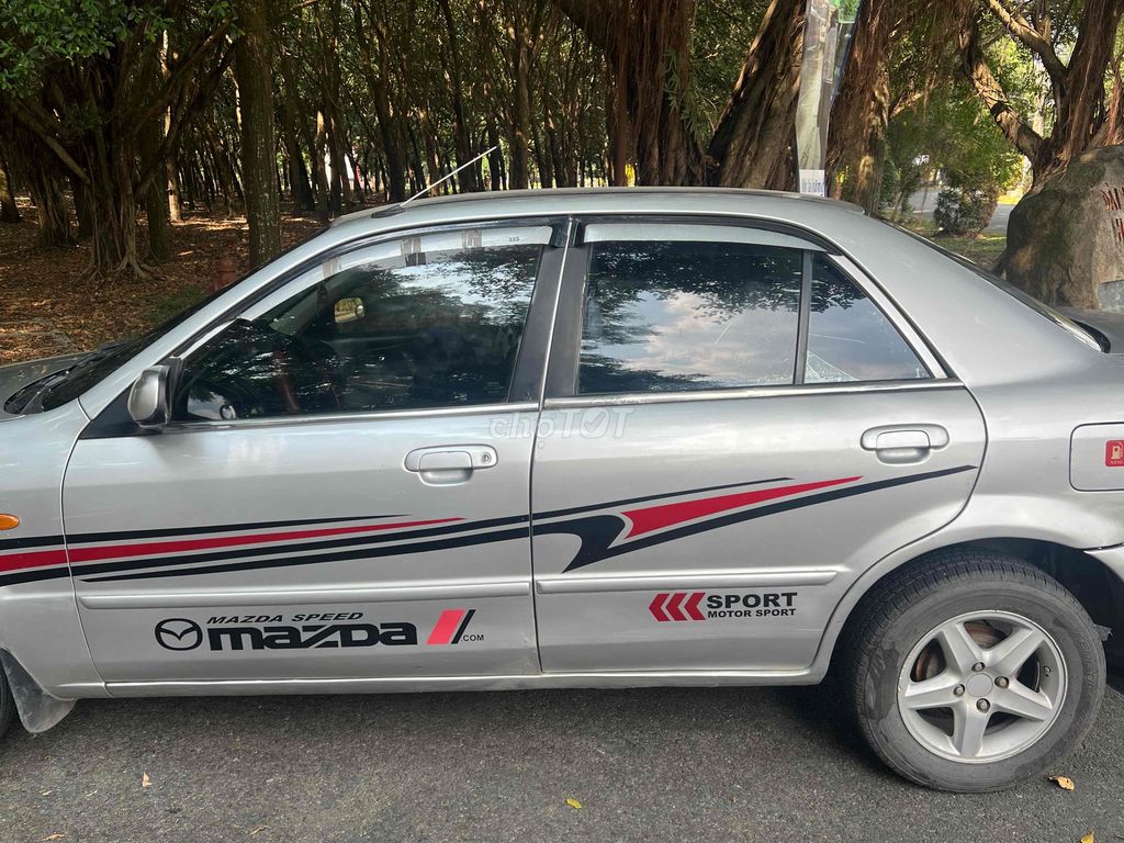 Mazda 2002 Số sàn màu Bạc. Mua bán Ô tô tại Quận Gò Vấp Tp Hồ Chí Minh được đăng bởi Dũng hình 4