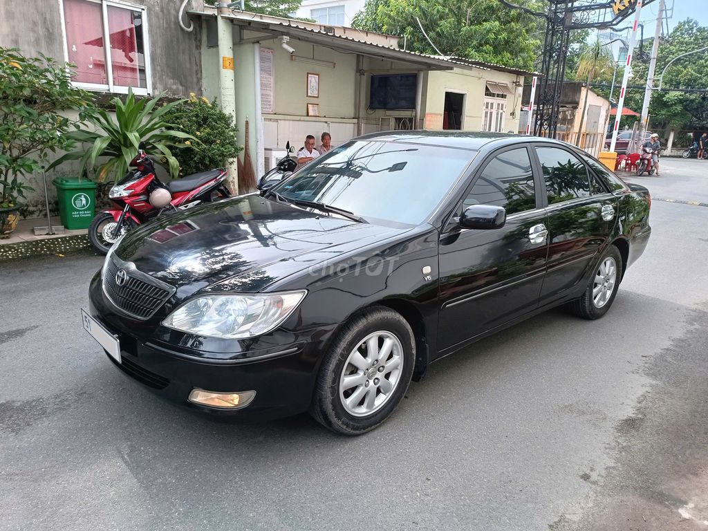 Toyota Camry 3.0V model 2004 màu đen cọp. Mua bán Ô tô tại Quận Gò Vấp Tp Hồ Chí Minh được đăng bởi Việt 8080 hình 2