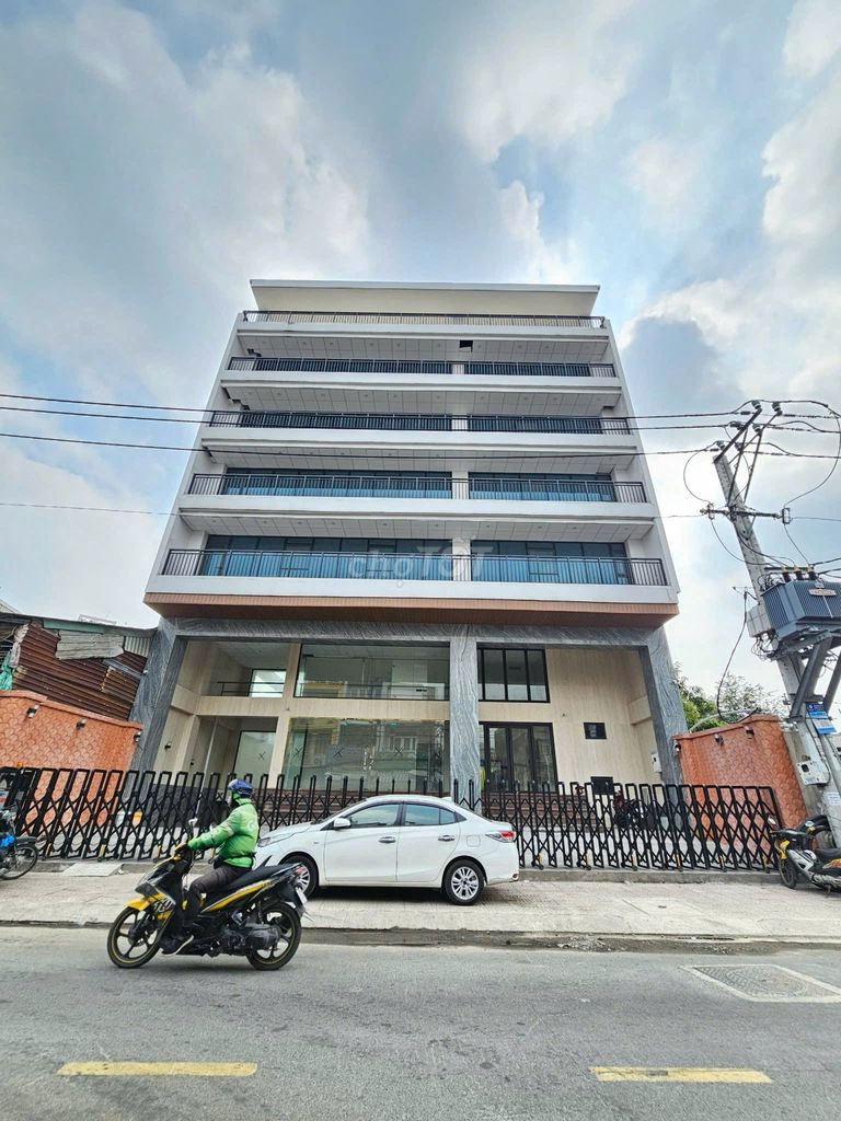 TÒA NHÀ MỚI NGUYỄN TRỌNG TUYỂN ngang 15m DTSD 1000m2 HẦM-7 TẦNG -TM