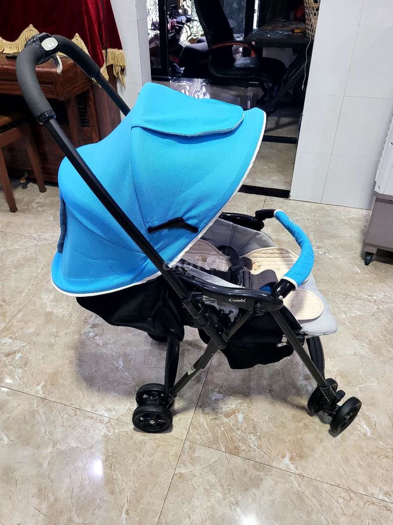 Xe đẩy Combi Mechacal First Xanh dương gấp gọn. Mua bán Mẹ và bé tại Thành phố Dĩ An Bình Dương được đăng bởi Đăng Quang hình 1