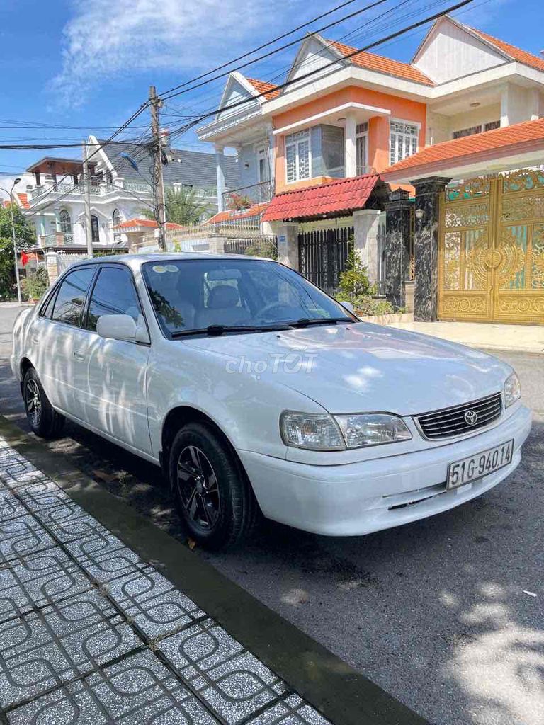 Toyota Corolla 1.6 Trắng 5 chỗ. Mua bán Ô tô tại Thành phố Bến Tre Bến Tre được đăng bởi Phương Bến Tre hình 4