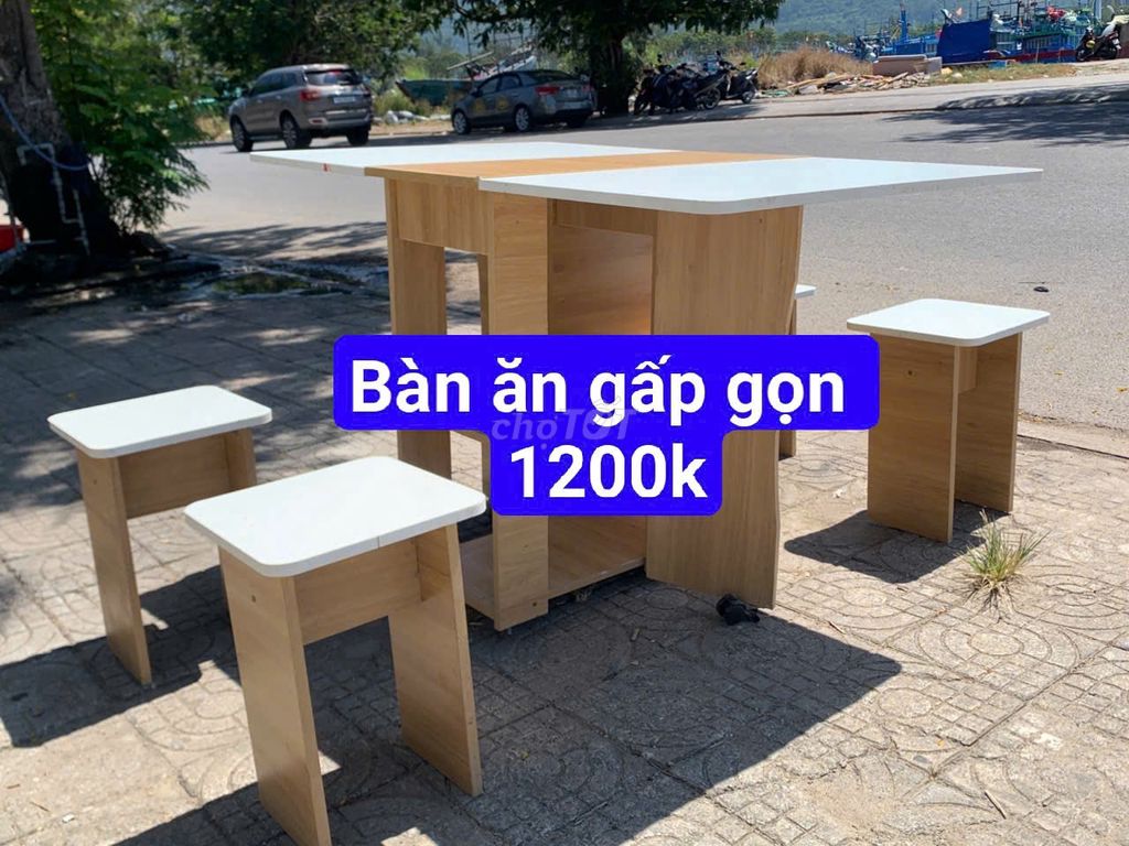 Bàn ăn gấp gọn Gỗ Vàng nhạt. Dịch vụ chuyển nhà tại Quận Sơn Trà Đà Nẵng được đăng bởi THẾ GIỚI ĐỒ CŨ ĐÀ NẴNG hình 1