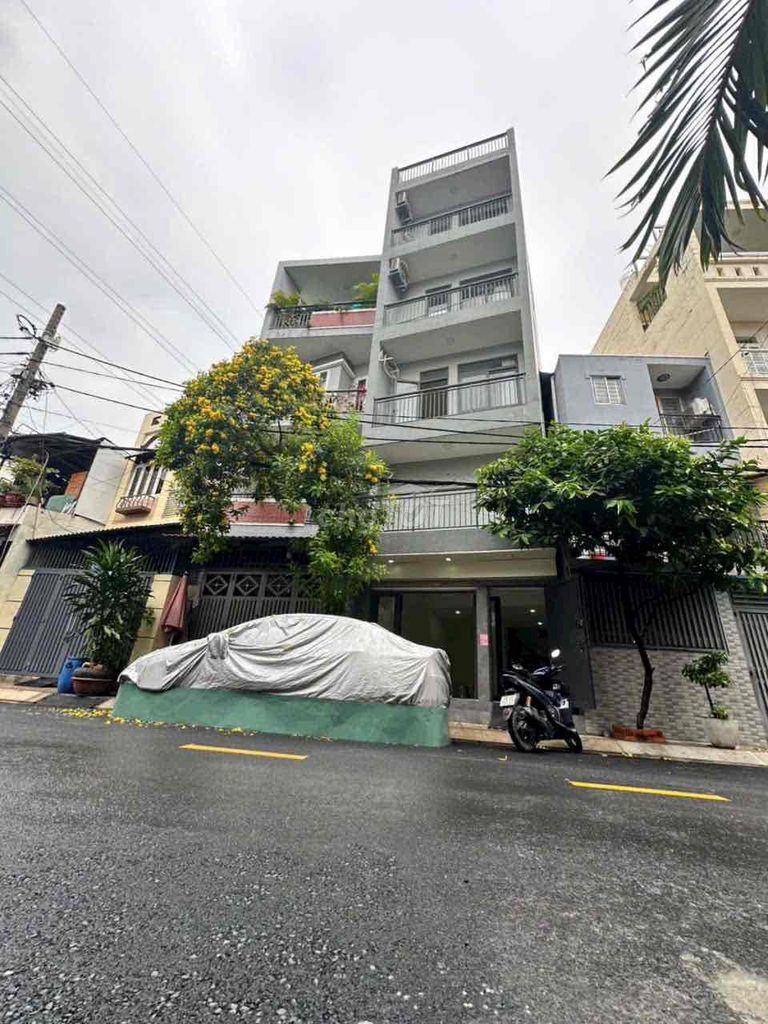 Giá 9.5 tỷ sở hửu ngay nhà 4 lầu mặt tiền nguyễn trường tộ tân phú