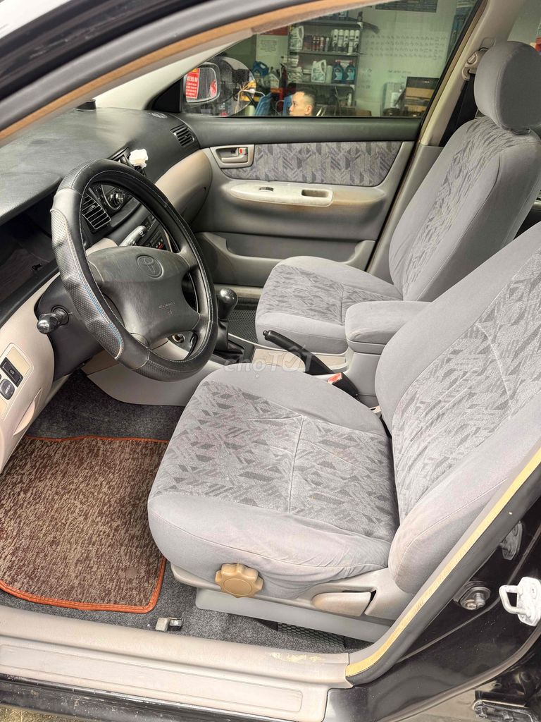 Toyota Corolla Altis 2002 черный 200 тыс. км