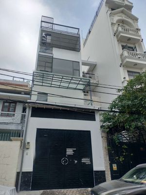 Bán nhà Mặt Tiền đường số DT:4,5x13 nhà 5Tầng phường tân quy quận 7
