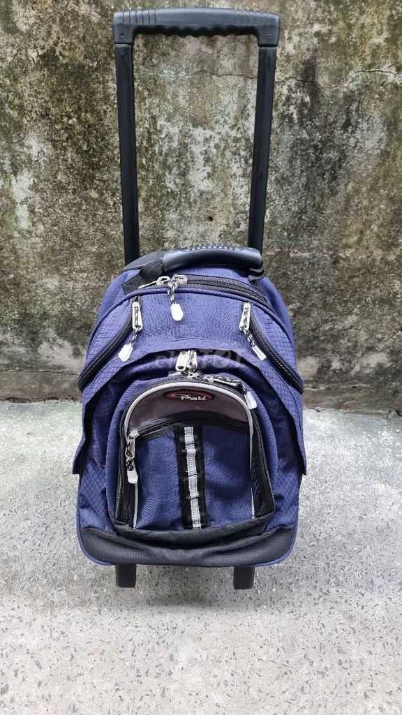 92.1286 Cal Pak Rolling Backpack Bookbag Blue.