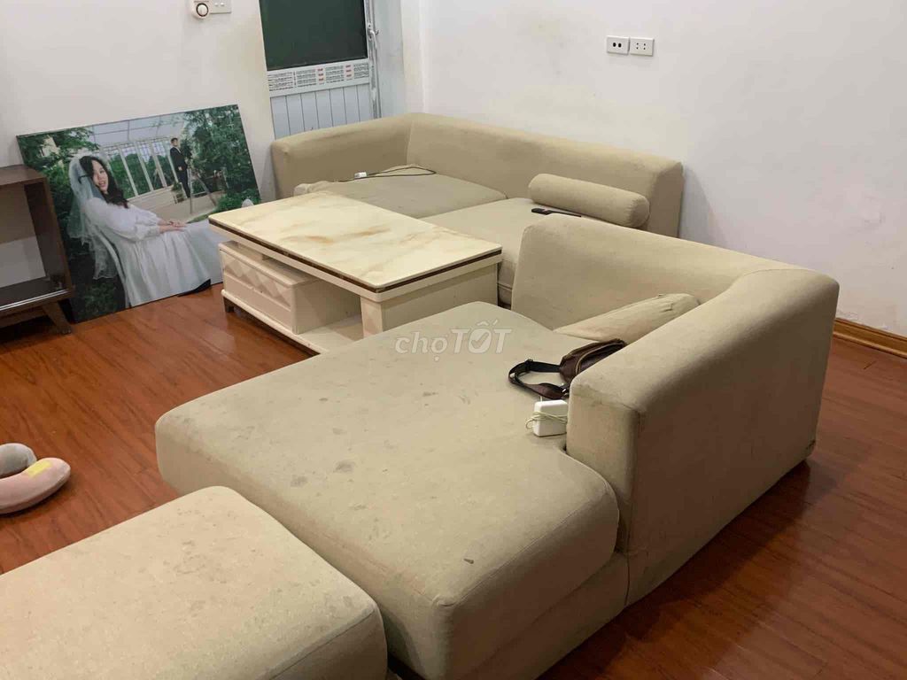 Bàn đá nước 1m2x60cm và sofa 2mx2m4 màu kem