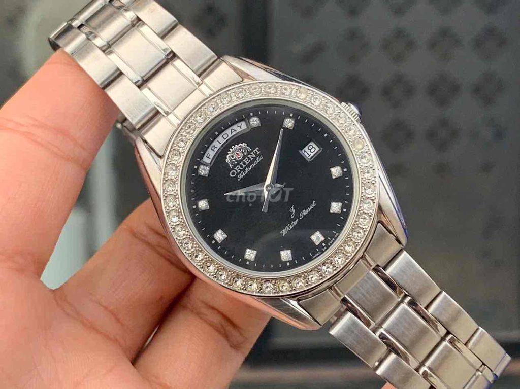 Tiểu Rolex Orient Piano Black Dial EV06 38mm