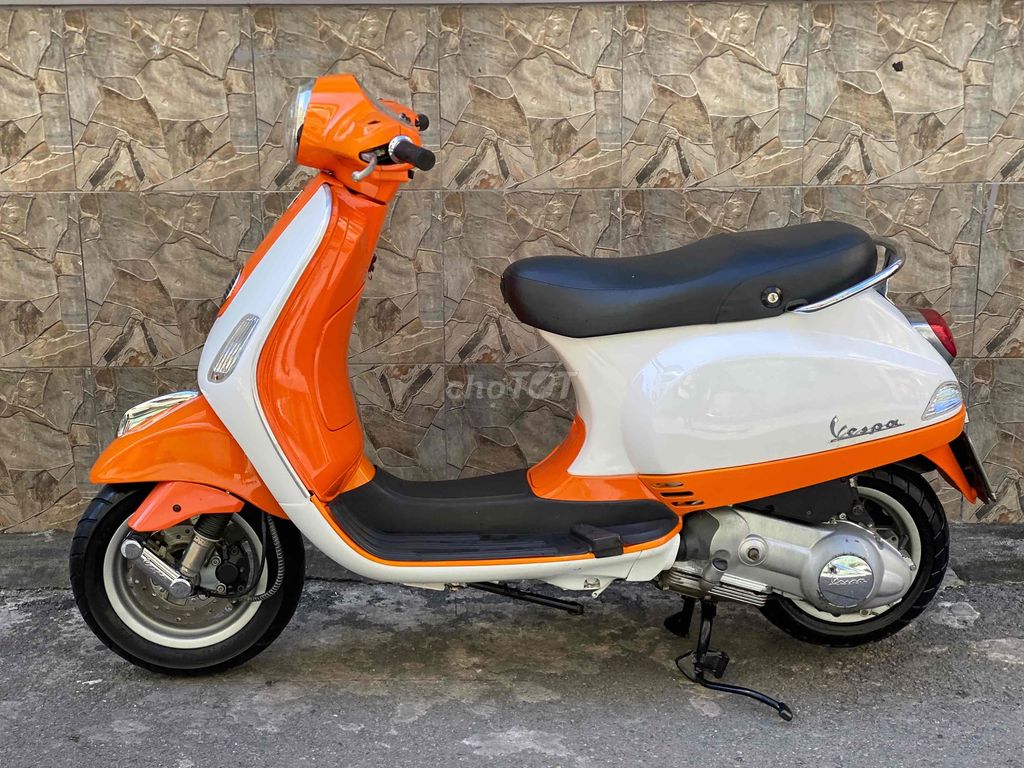 Vespa trắng cam Sporty bstp chính chủ nhập ý