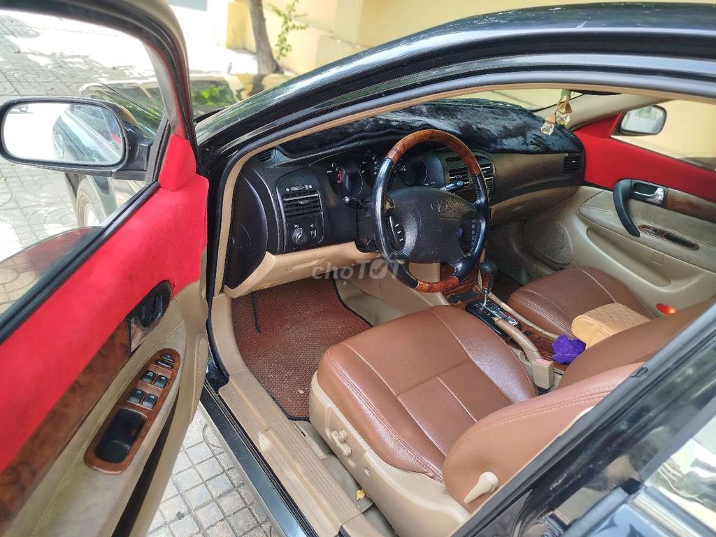 Daewoo Magnus 2004 черный автомат