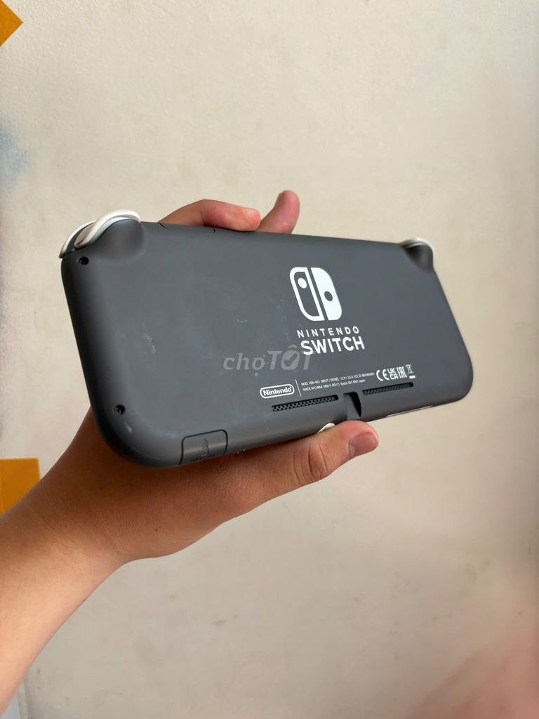 Máy chơi game Nintendo Switch Lite Xám/Vàng. Mua bán Thiết bị chơi game tại Quận 10 Tp Hồ Chí Minh được đăng bởi MộcPhạmWeGames hình 1