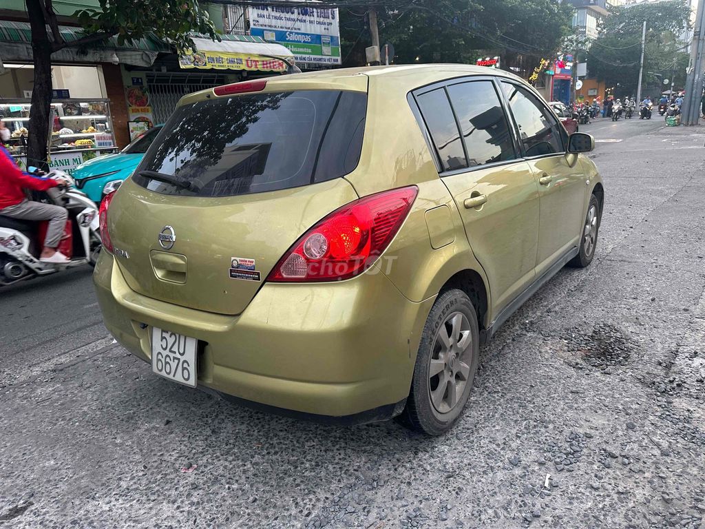 Nissan Tiida Vàng đồng 5 chỗ Số tự động. Mua bán Ô tô tại Quận Tân Phú Tp Hồ Chí Minh được đăng bởi Bảo Lam hình 1
