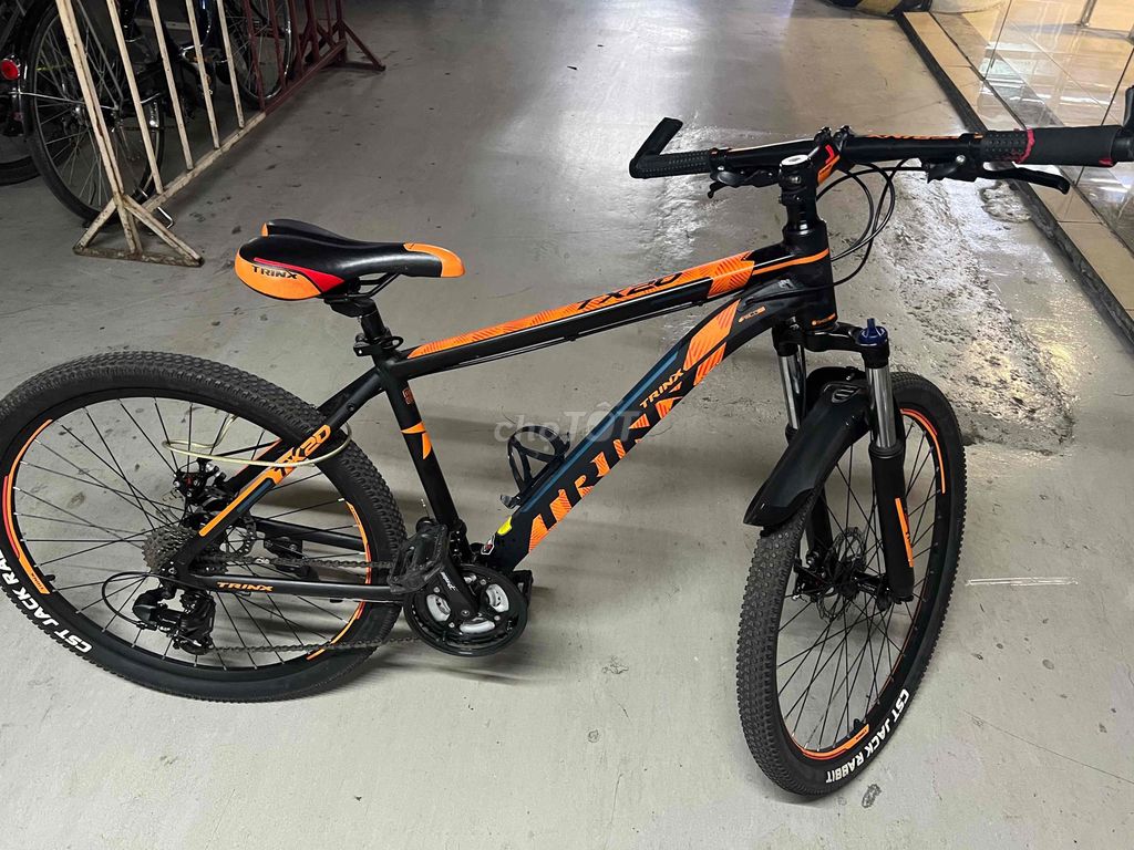 Xe đạp thể thao Trinx Đen cam. Mua bán Xe đạp tại Quận Đống Đa Hà Nội được đăng bởi Thanh Hà hình 1