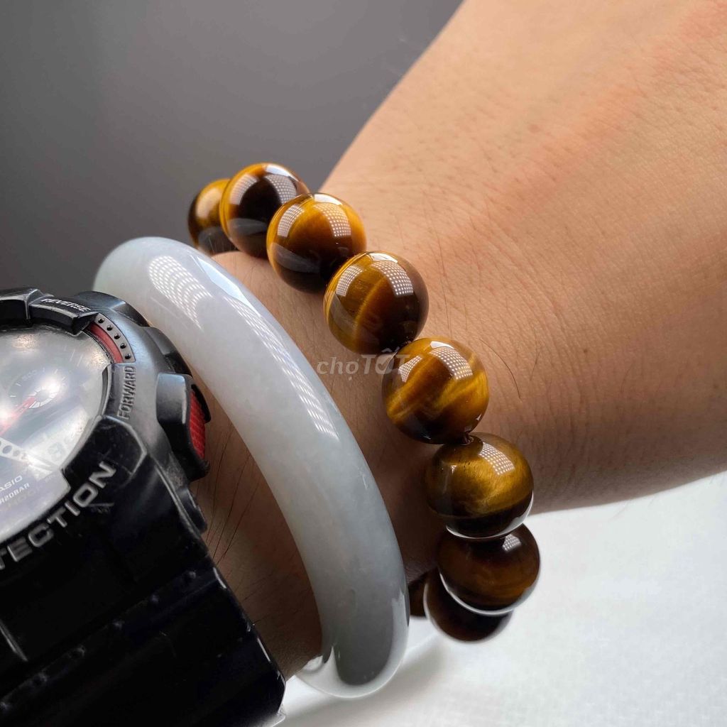 Vòng tay Nam Đá mắt hổ 14mm. Mua bán Đồ sưu tầm, đồ cổ tại Quận 5 Tp Hồ Chí Minh được đăng bởi Đá Phong Thuỷ Quận 5 hình 1