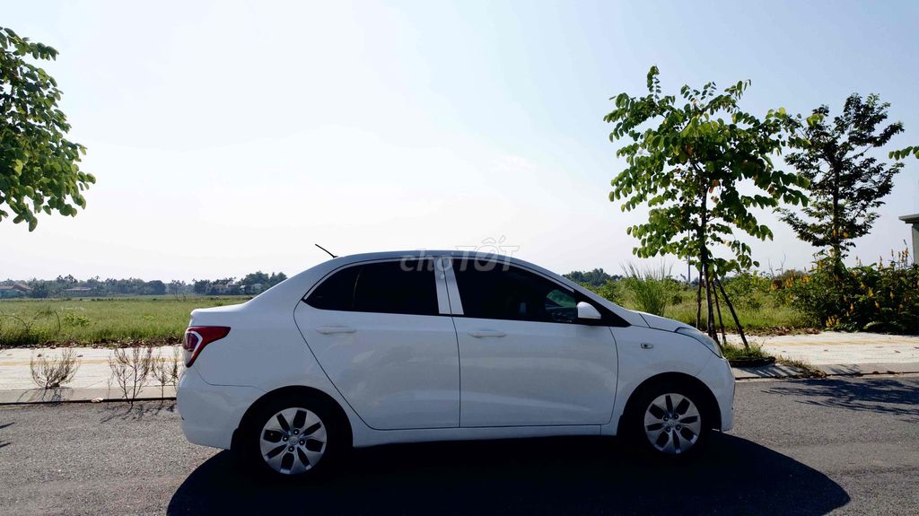 Белый бензиновый номер Hyundai i10 Седан 2015