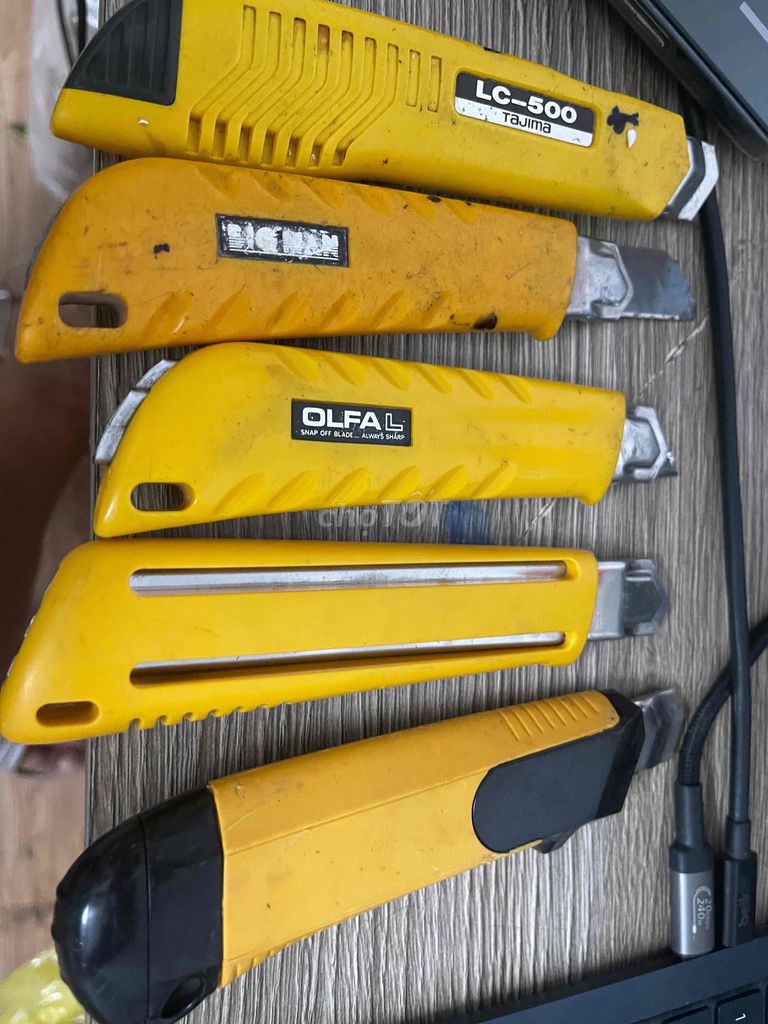 Dao rọc giấy Olfa Tajima Thép trắng, Đen Nhật bản. Mua bán Đồ dùng văn phòng tại Quận Phú Nhuận Tp Hồ Chí Minh được đăng bởi Minh Ánh hình 1