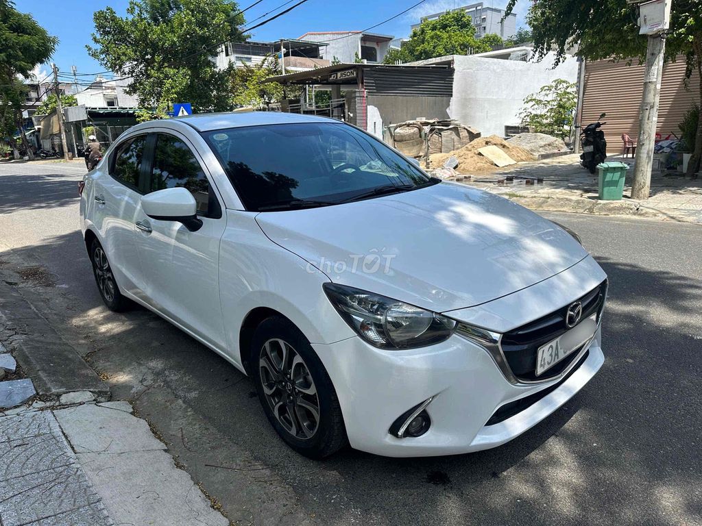Mazda Mazda 2 2016 Белый 110 тыс. км