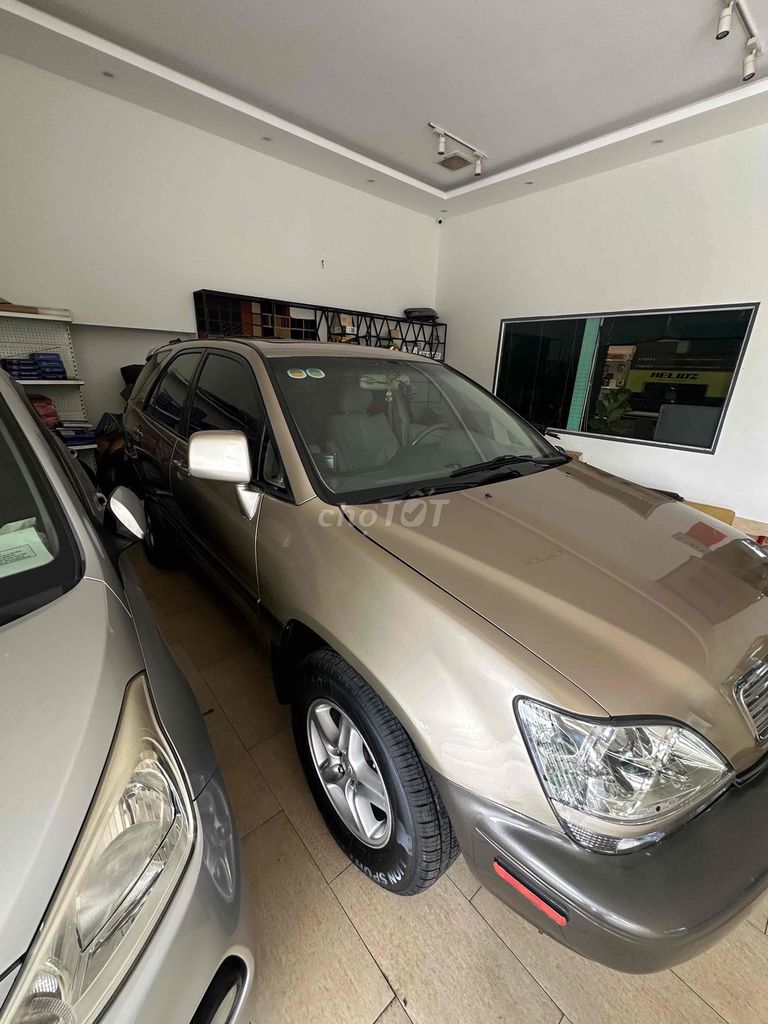Lexus RX 300 Vàng cát 5 chỗ. Mua bán Ô tô tại Thành phố Biên Hòa Đồng Nai được đăng bởi Tran Hieu Car hình 3