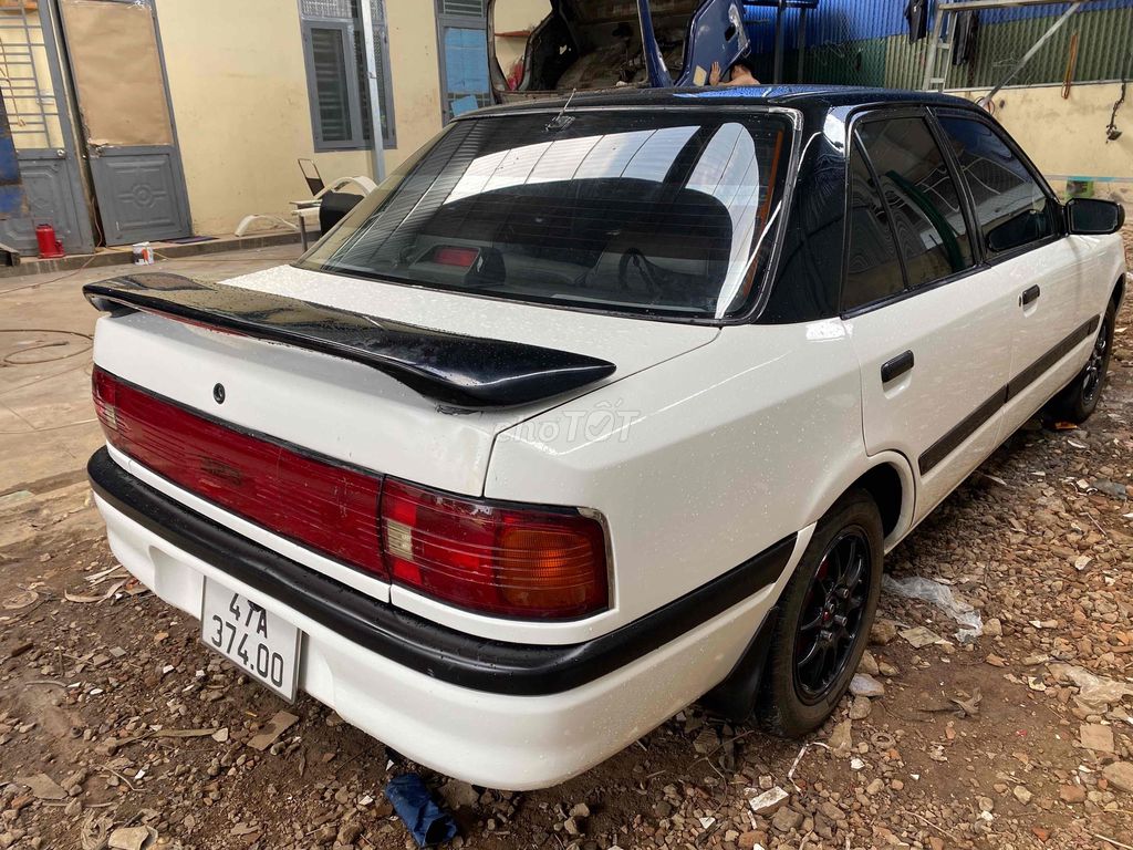 Mazda 323 1997 1.6 MT - 75000 km. Mua bán Ô tô tại Thành phố Buôn Ma Thuột Đắk Lắk được đăng bởi nhỏ hình 6