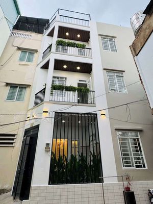 nhà mới xây 4 tầng đẹp vào ở nhay hẻm âu dương lân P3,Q8