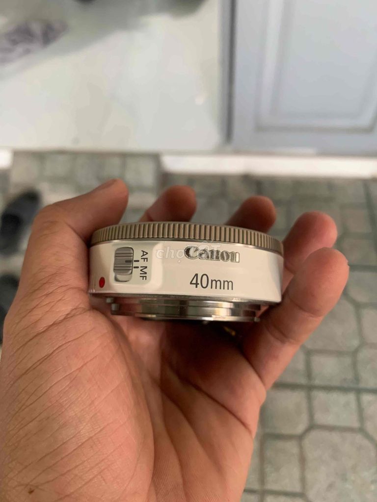 Ống kính Canon EF 40mm Trắng. Mua bán Máy ảnh, Máy quay tại Thành phố Dĩ An Bình Dương được đăng bởi Cậu Ba Joon hình 1